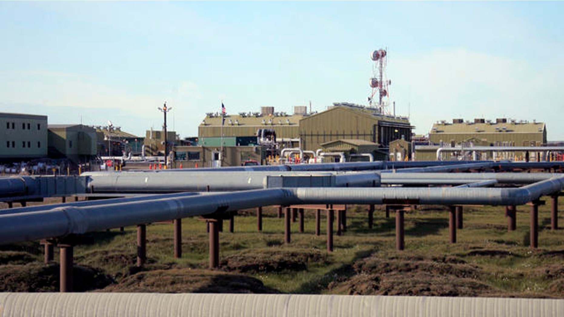 Shown here are oil and gas pipelines running into Alyeska's trans-Alaska oil pipeline pump station in Deadhorse, Alaska.