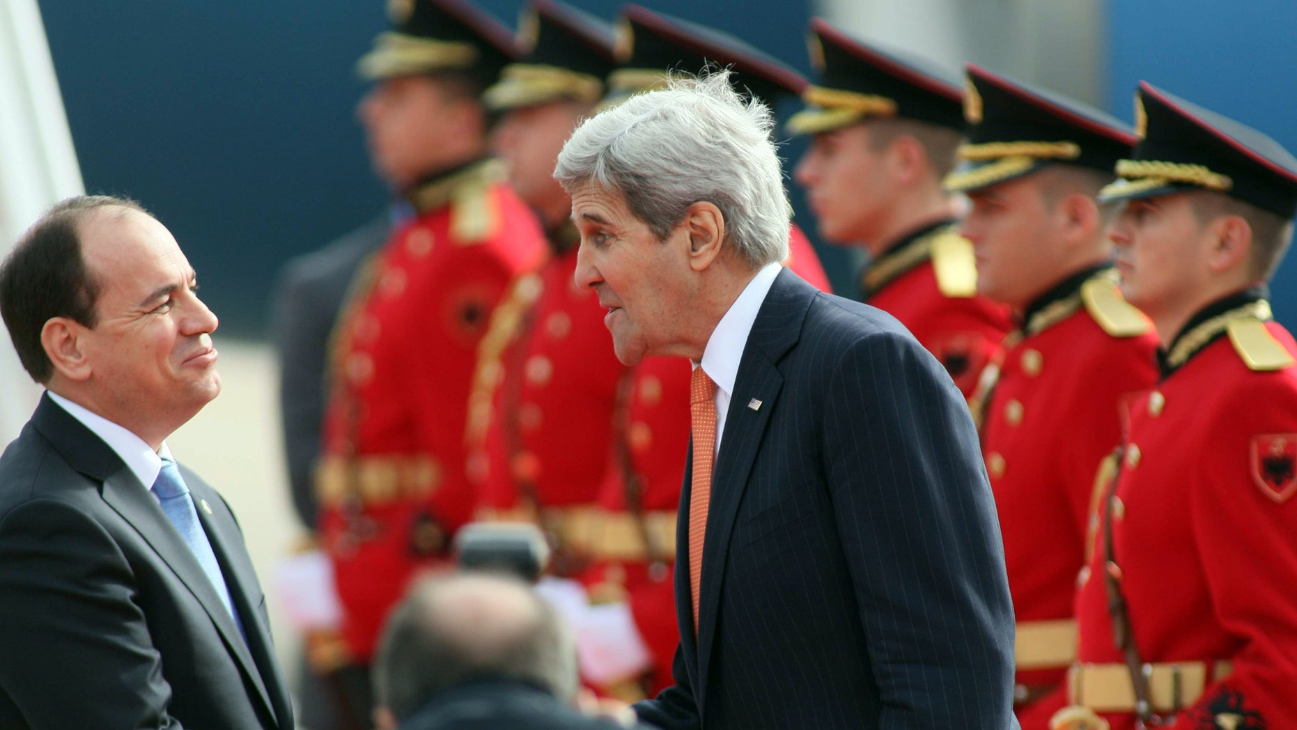 Feb. 14, 2016: U.S Secretary of State John Kerry, right, meets with host Albanian President Bujar Nishani after landing at the International Airport Mother Teresa, Tirana.