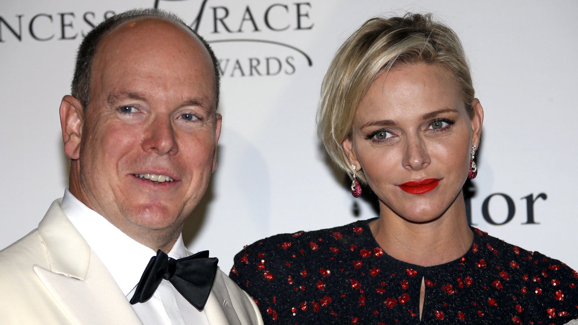 September 5, 2015. Prince Albert II of Monaco and his wife Princess Charlene pose at the Princess Grace Awards gala in Monaco.