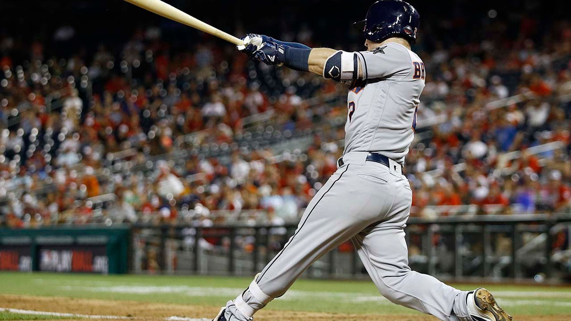 Houston Astros Alex Bregman (2) hits a solo home run in the 10th inning during the Major League Baseball All-Star Game, Tuesday, July 17, 2018 in Washington.