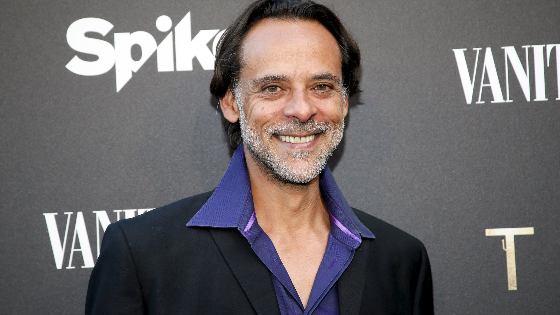 Cast member Alexander Siddig poses at a cocktail party hosted by Vanity Fair and Spike TV to celebrate Spike's new event series Tut, at Chateau Marmont in West Hollywood, California, July 8, 2015. REUTERS/Danny Moloshok - RTX1JN5E