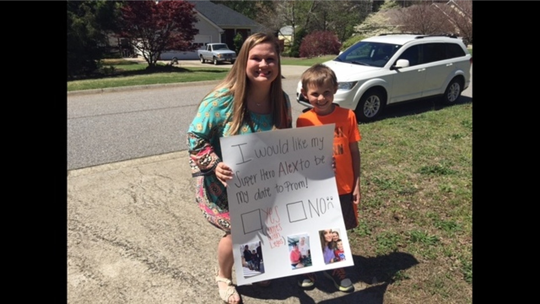 Shelby Butler, left, asked her "superhero" Alex Richards, right, to prom.