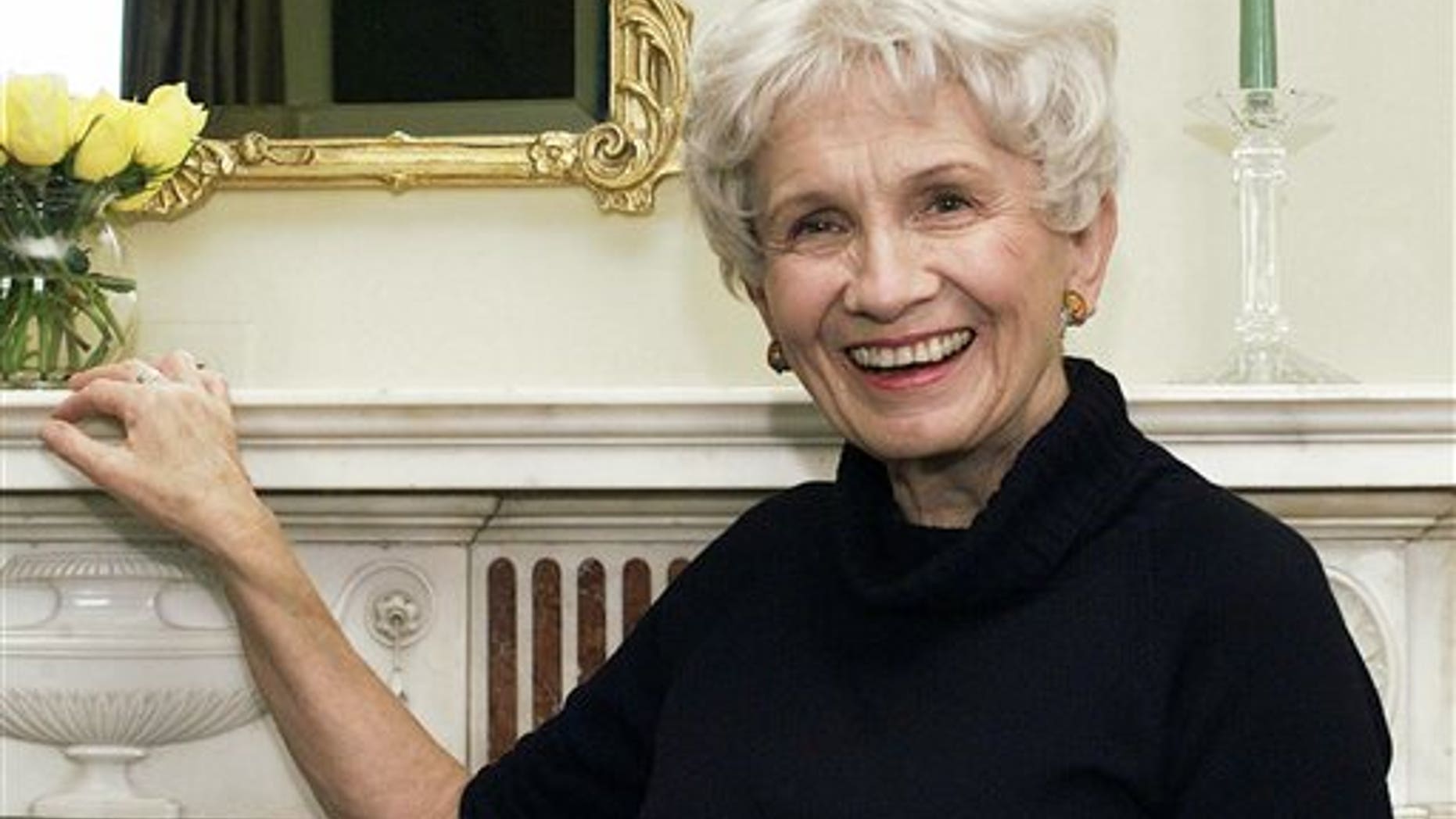In this Oct. 28, 2002 file photo, Canadian author Alice Munro poses for a photograph at the Canadian Consulate's residence in New York. Munro has won this year's Nobel Prize in literature it was announced Thursday Oct. 10, 2013.