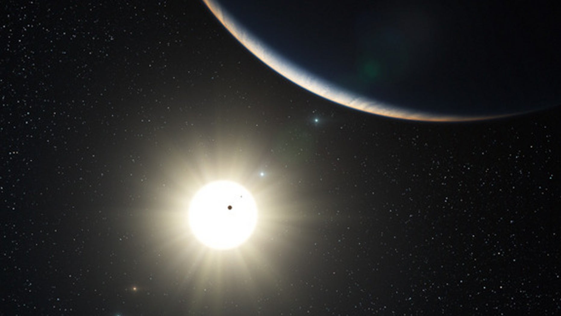 This artist's impression shows the remarkable planetary system around the sun-like star HD 10180.