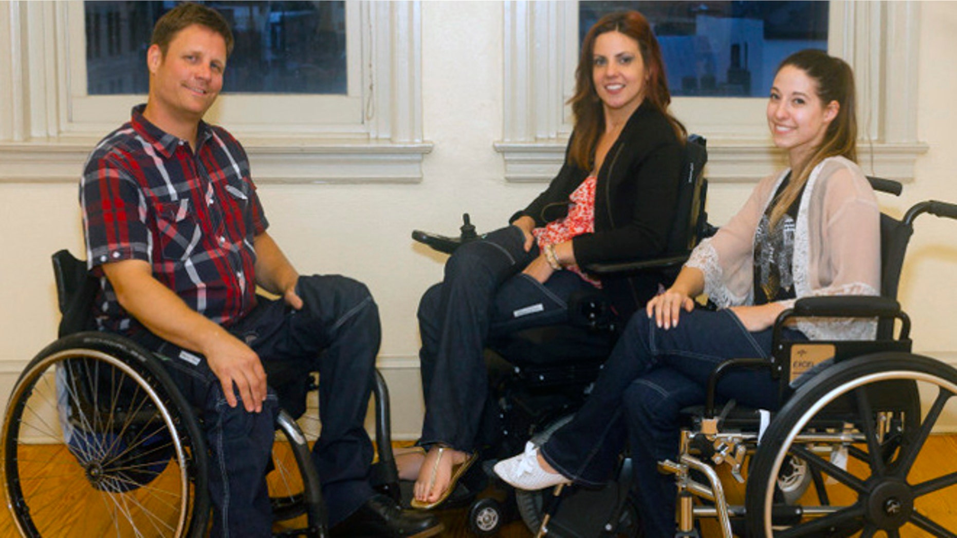 Heidi McKenzie, center, created a pair of practical, wheelchair-friendly jeans under the label "Alter Ur Ego."