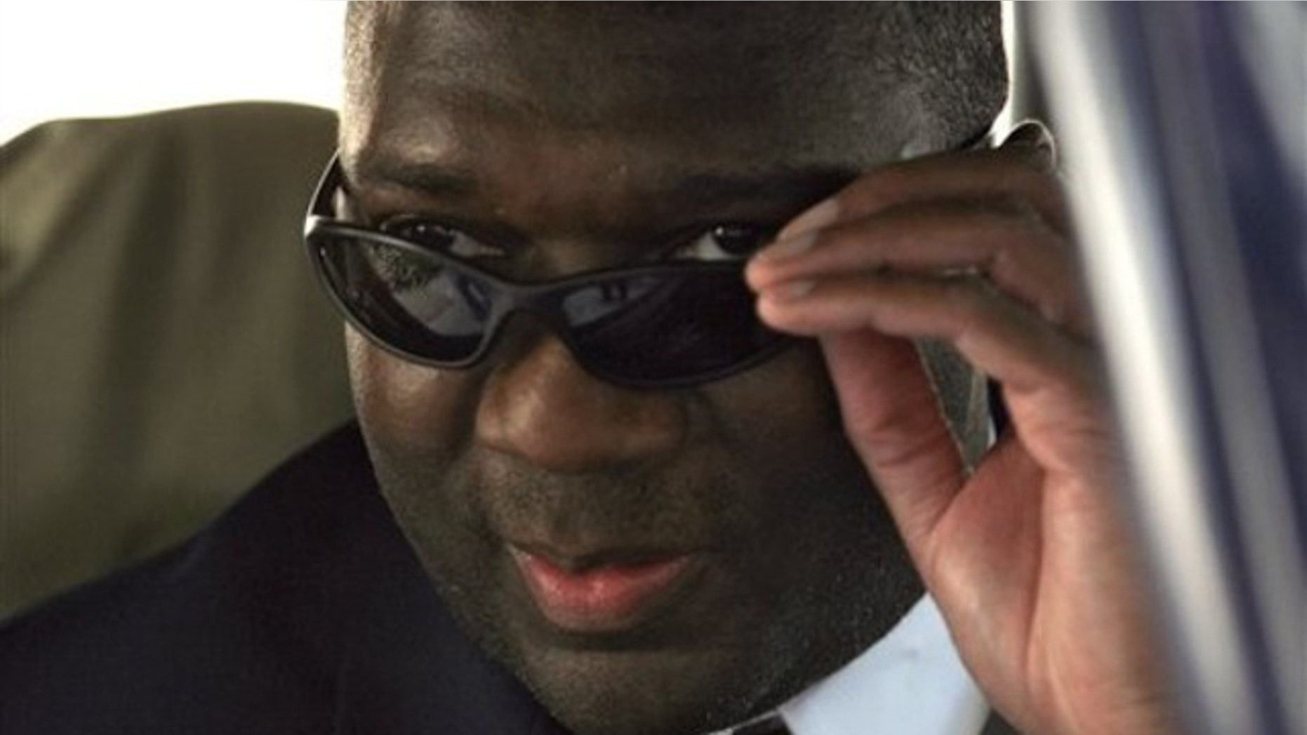Democratic candidate for U.S. Senate, Alvin Greene, leaves the Richland County Courthouse in Columbia, S.C. , following a bond hearing on his misdemeanor obscenity charge, Thursday, Oct. 7, 2010. (AP)