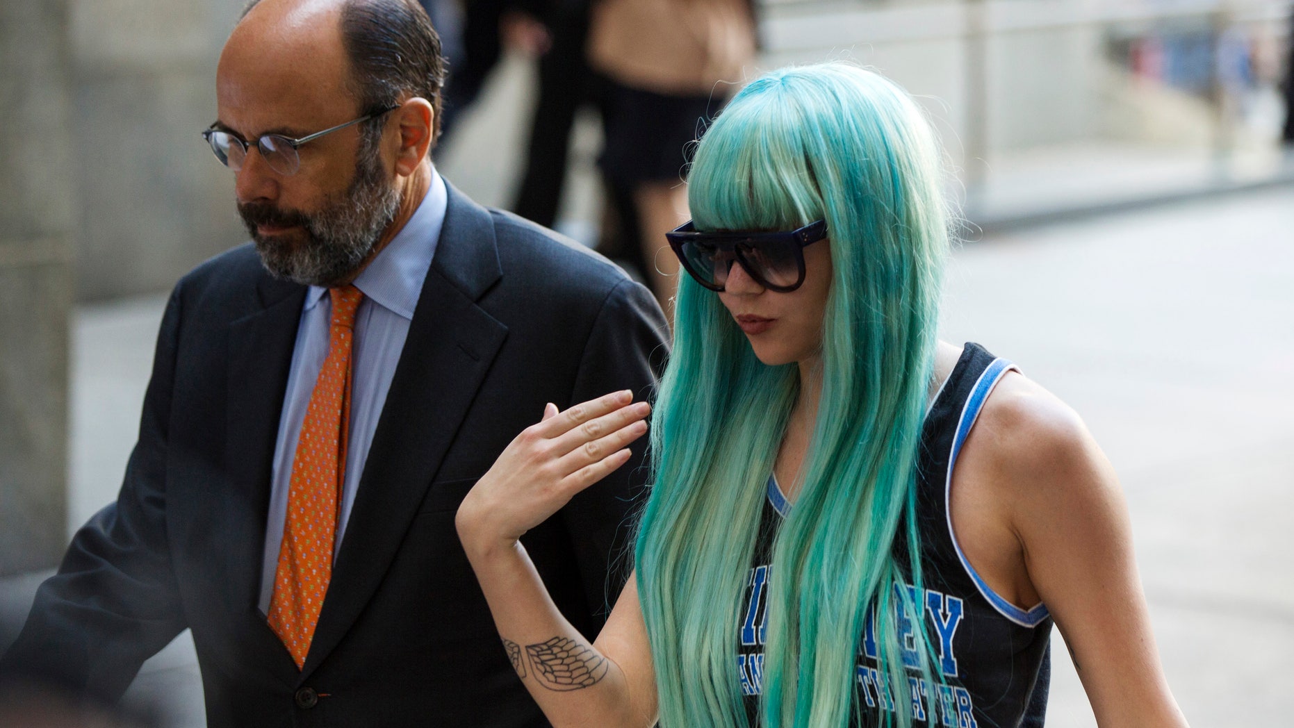 July 9, 2013. Actress Amanda Bynes arrives for a court hearing at Manhattan Criminal Court in New York. Bynes is charged with reckless endangerment and attempted tampering with physical evidence.
