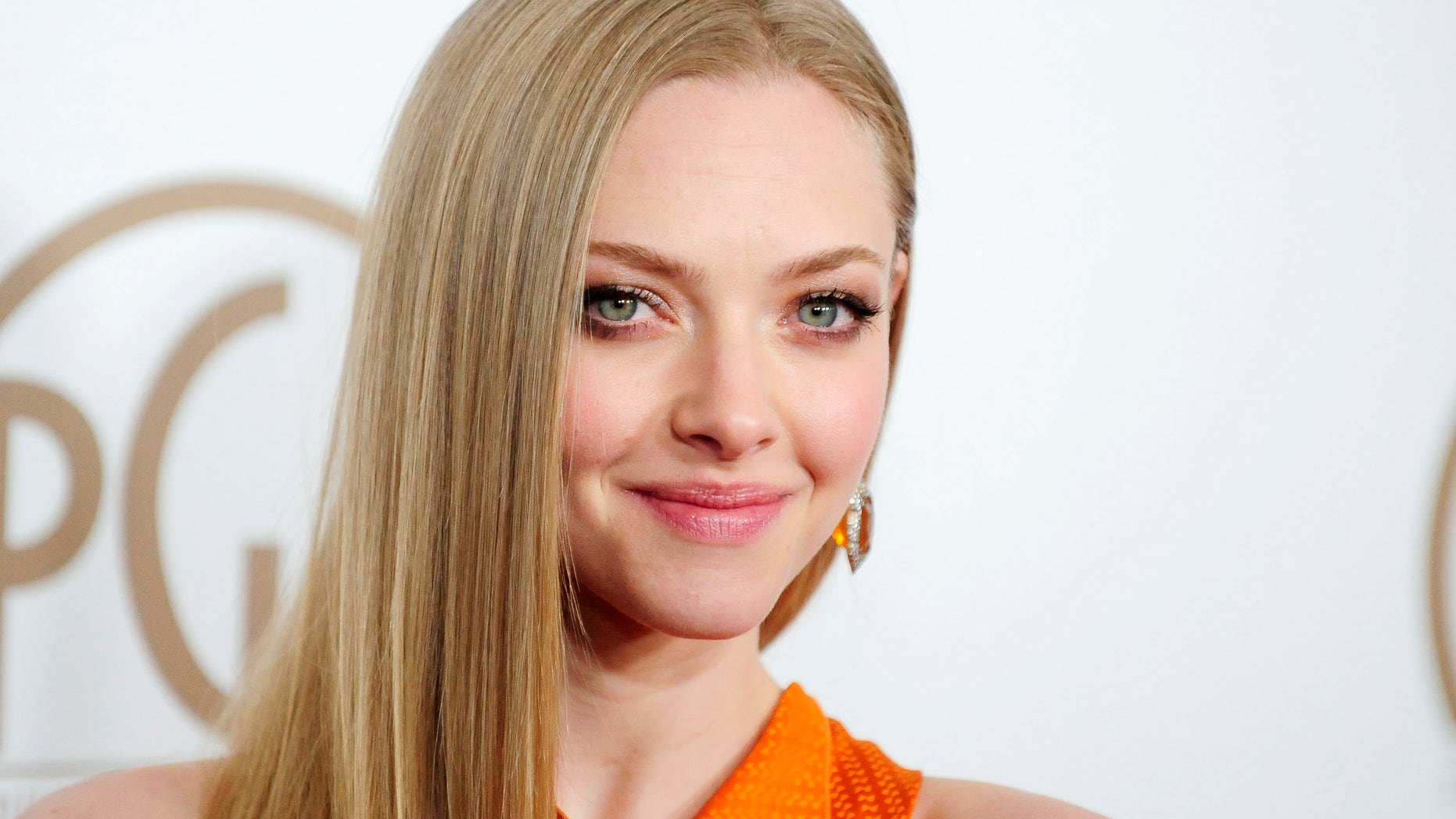 Actress Amanda Seyfried arrives at the Producers Guild of America Awards in Beverly Hills, California Jan. 26, 2013.