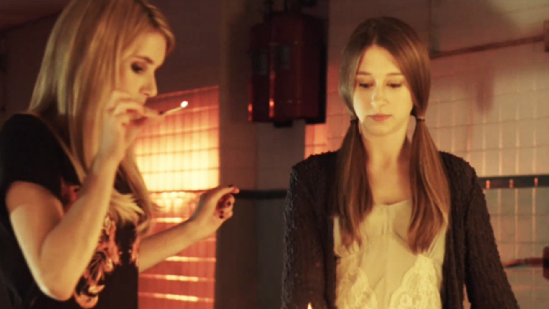 A scene from "American Horror Story Coven" is shown.
