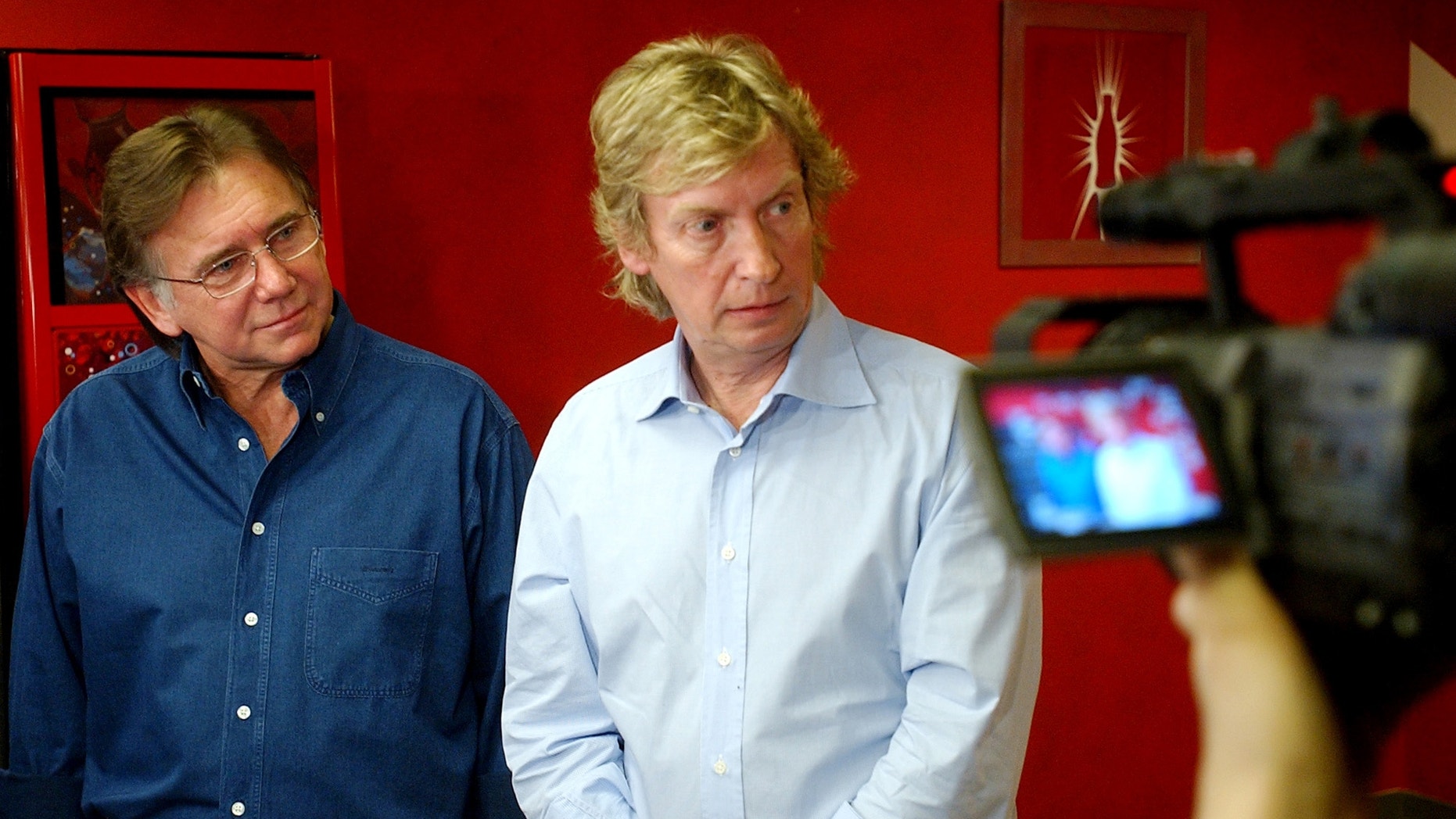 This March 15, 2005 file photo shows former "American Idol" producers Ken Warwick, left, and Nigel Lythgoe during a news conference in Los Angeles.