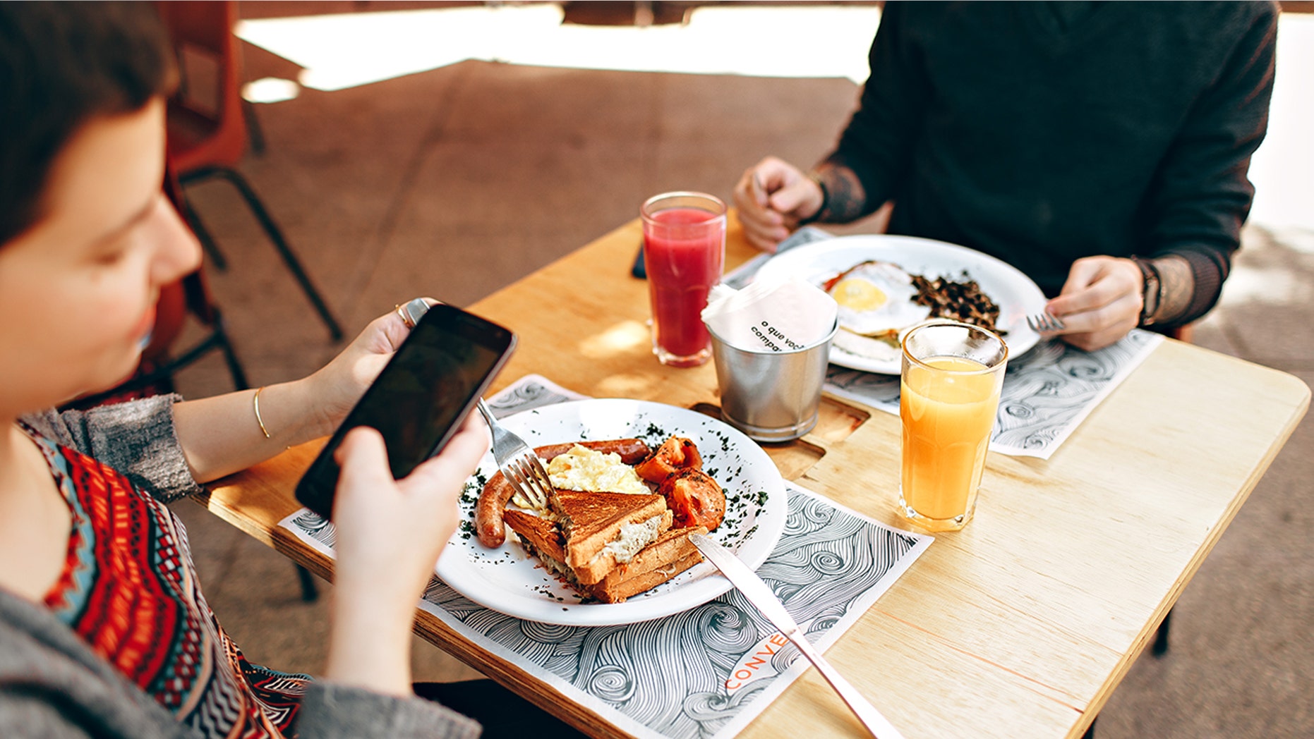 A study commissioned by Nutrisystem found Americans are easily distracted during mealtime by their cellphones.
