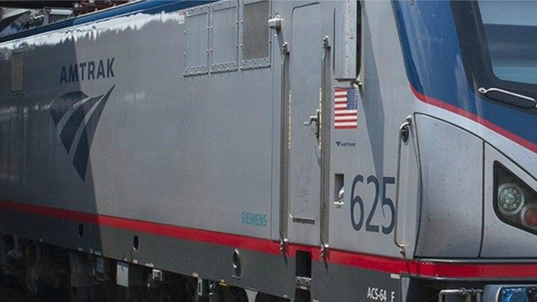 An Amtrak locomotive is shown.