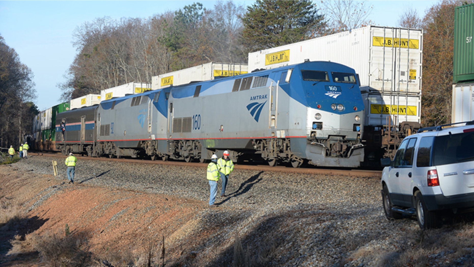 Nov. 25, 2013: Railway workers inspect an Amtrak train derailed in Spartanburg County, S.C.