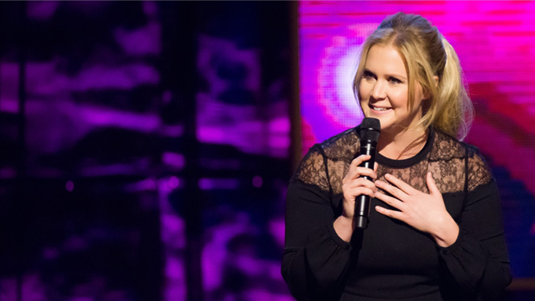 Feb. 28, 2015. Amy Schumer appears onstage at Comedy Central's "Night of Too Many Stars: America Comes Together for Autism Programs" at the Beacon Theatre in New York. Schumer hosts the MTV Movie Awards show on Sunday, April 12, 2015.