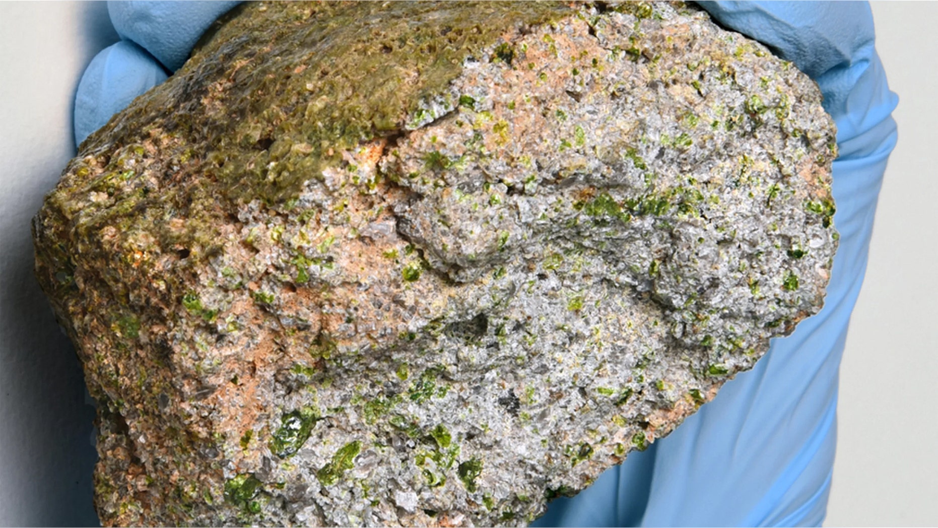The NWA 11119 meteorite is about the size of a baseball and is estimated to be 4.6 billion years old. Credit: UNM Newsroom