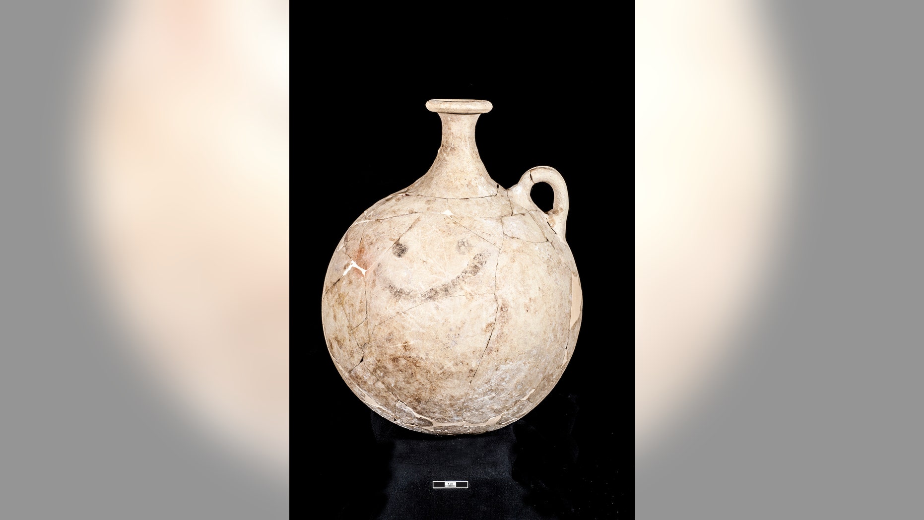 Perhaps the world's oldest "smile" — a painted flask from 1700 B.C. found in a burial site in Karkemish, an ancient city in modern-day Turkey.