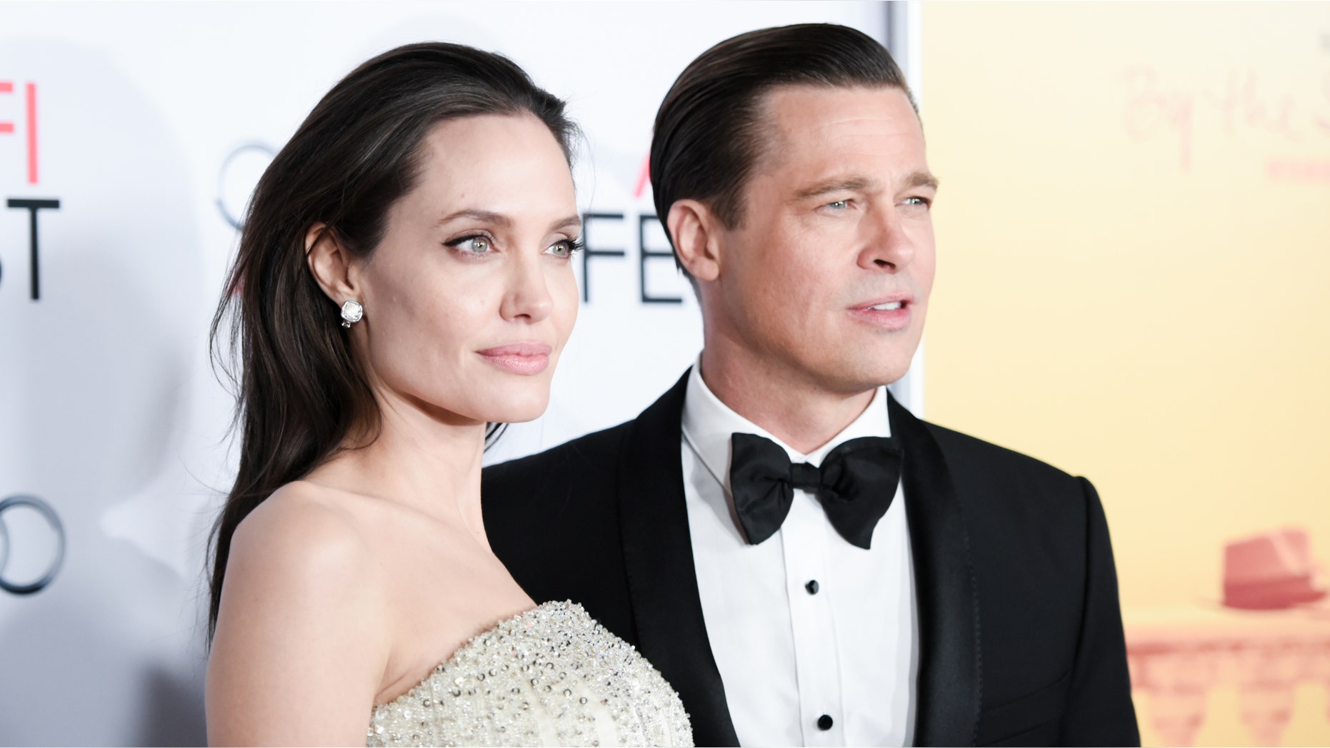 November 5, 2015. Angelina Jolie, left, and Brad Pitt arrive at the 2015 AFI Fest opening night premiere of "By The Sea."