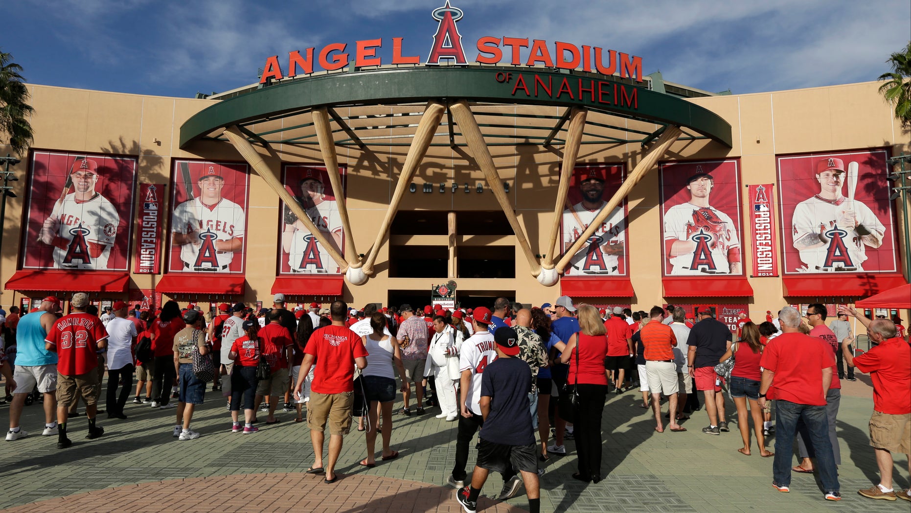 Oct. 3, 2014: Fans enter Angel Stadium before Game 2 of baseball's AL Division Series between the Los Angeles Angels and the Kansas City Royals in Anaheim, Calif.