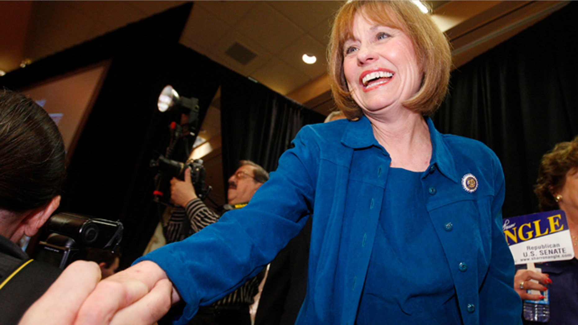 June 8: Nevada Republican Senate candidate Sharron Angle shakes hands of supporters in Las Vegas.