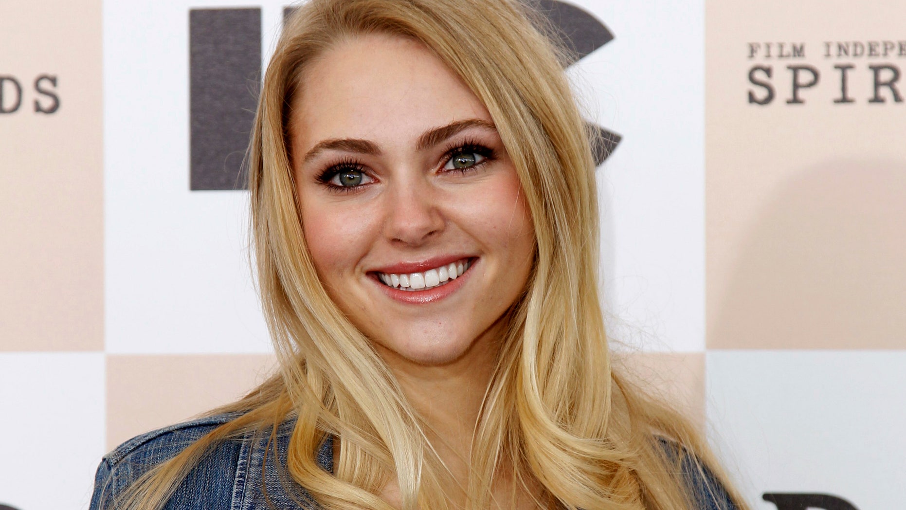 February 26, 2011. Actress AnnaSophia Robb arrives at the 2011 Film Independent Spirit Awards in Santa Monica, California.