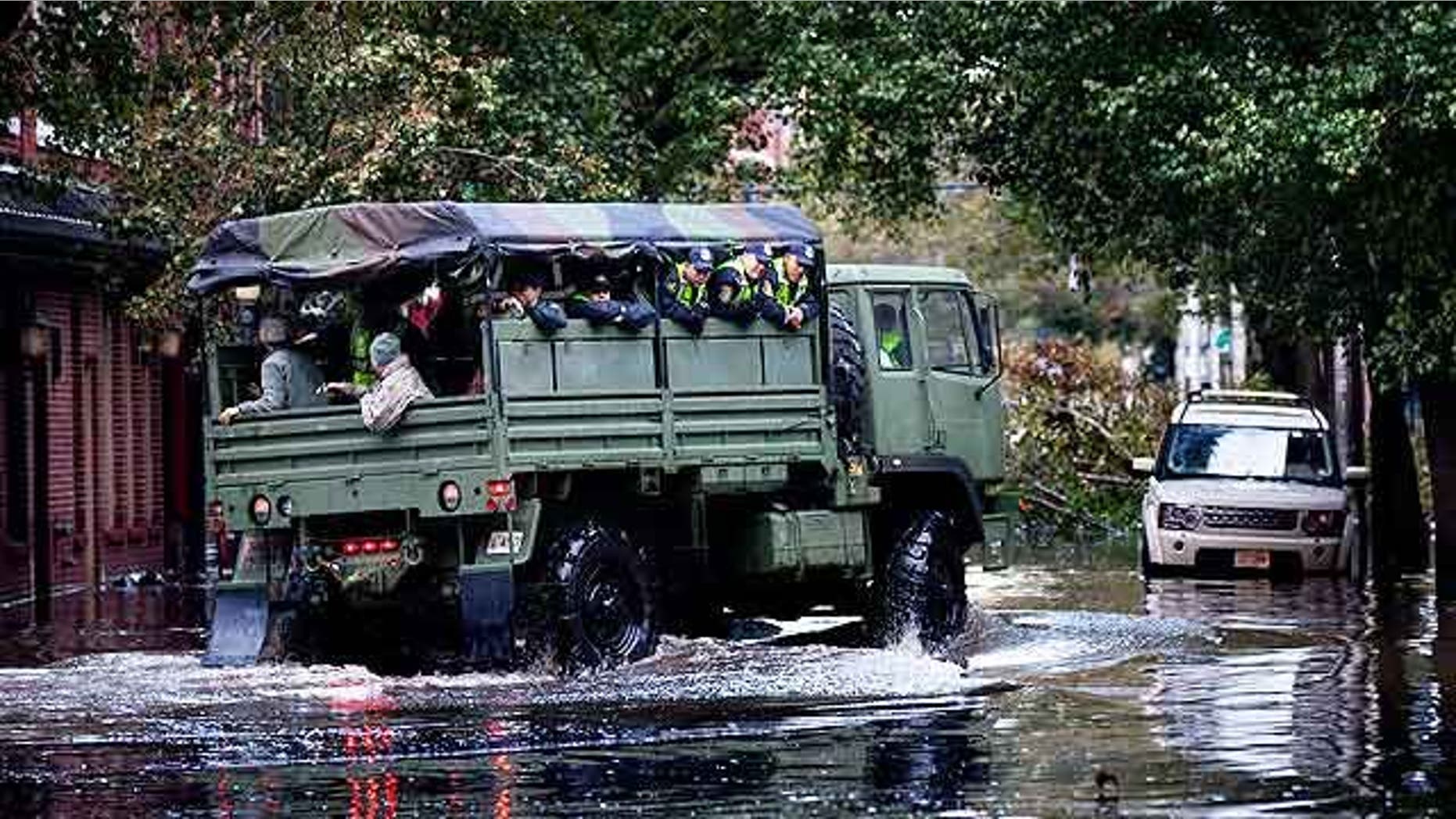 The National Guard arrived in Hoboken, NJ on Wednesday to rescue apartment dwellers who had been trapped since the storm began.