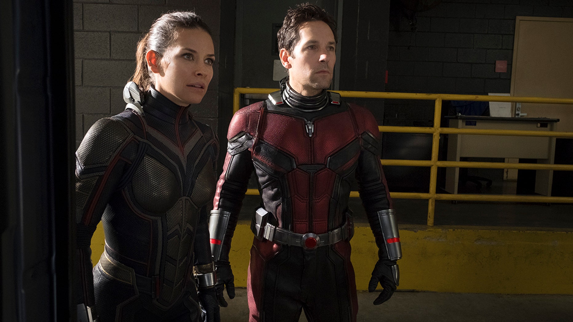 This image released by Marvel Studios shows Evangeline Lilly, left, and Paul Rudd in a scene from "Ant-Man and the Wasp." (Disney/Marvel Studios via AP)