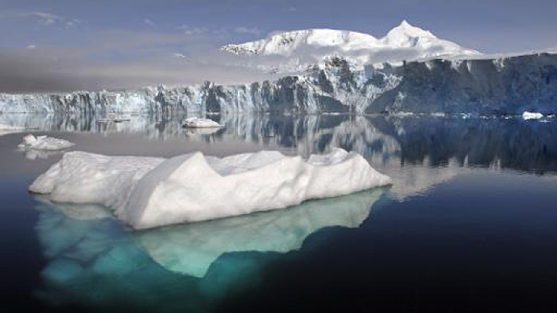 A view of Sheldon Glacier with Mount Barre in the background, seen from Ryder Bay near Rothera Research Station, Adelaide Island, Antarctica.