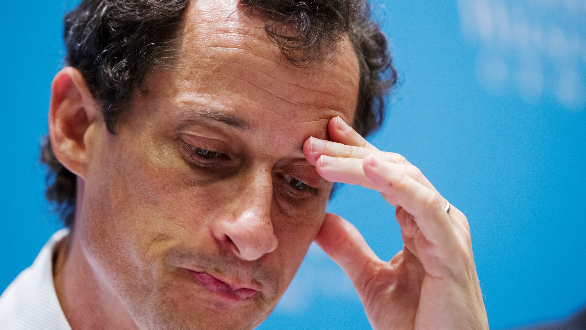 Anthony Weiner, a former U.S. congressman from New York and current democratic candidate for New York City Mayor, listens to fellow candidates speak at a debate held at the Museum of Tolerance in New York August 14, 2013. REUTERS/Lucas Jackson (UNITED STATES - Tags: POLITICS HEADSHOT ELECTIONS) - RTX12LUY