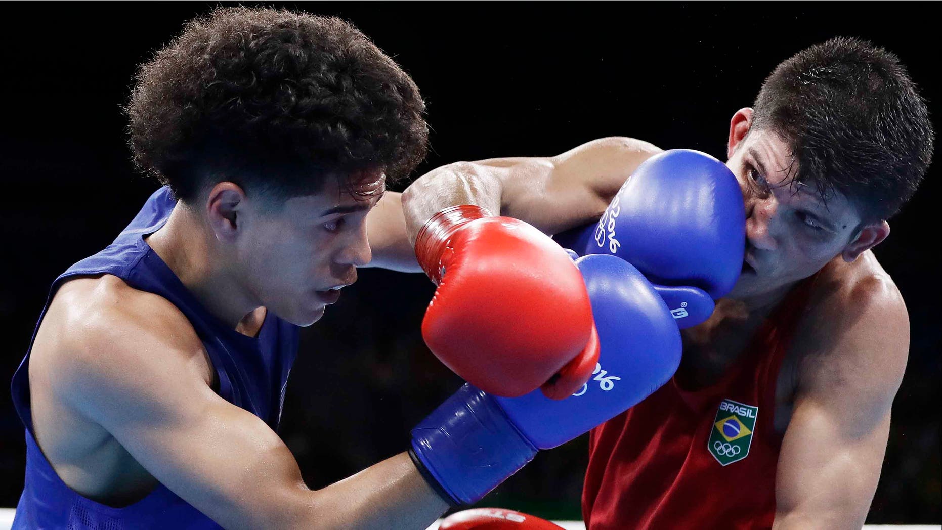 Antonio Vargas, left, during boxing match at the 2016 Summer Olympics in Rio de Janeiro, Brazil, Saturday, Aug. 13, 2016.