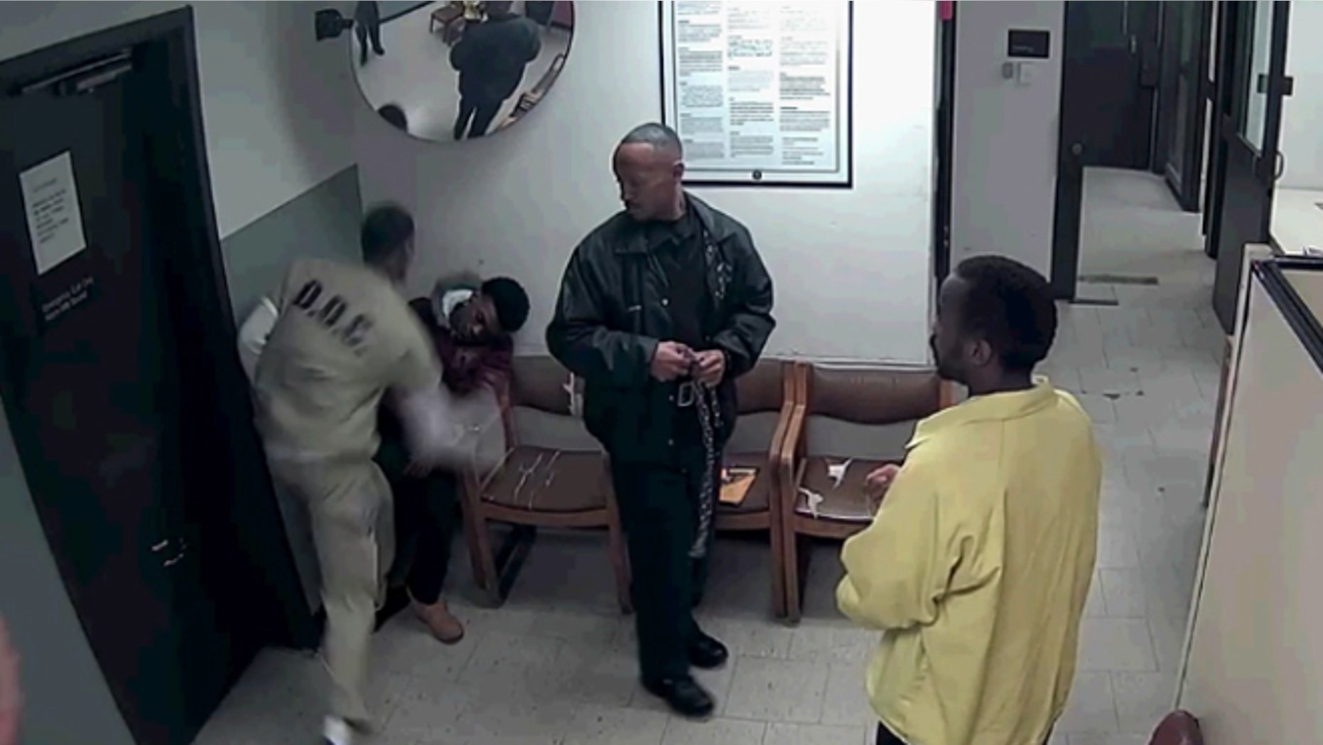 Screen grab from video showing Antwan Jones, 19, being attacked in a Chicago courthouse lockup Wednesday.