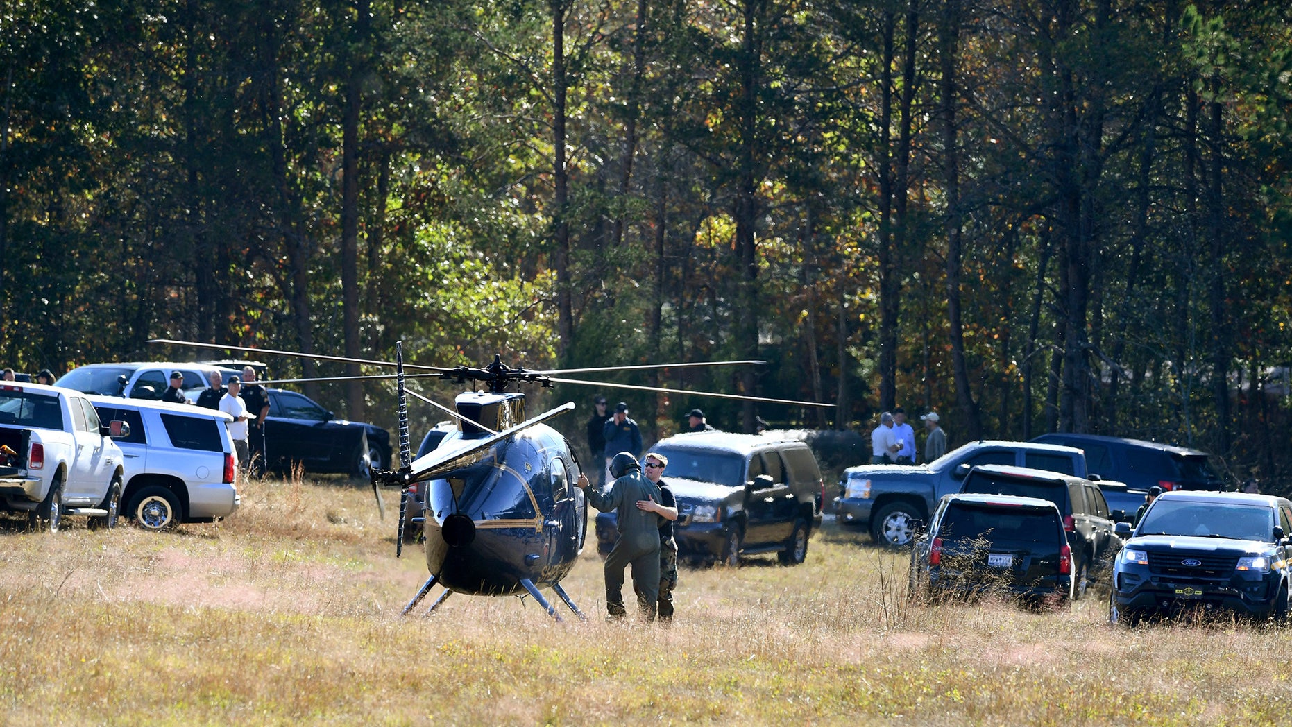 Investigators on the Woodruff property
