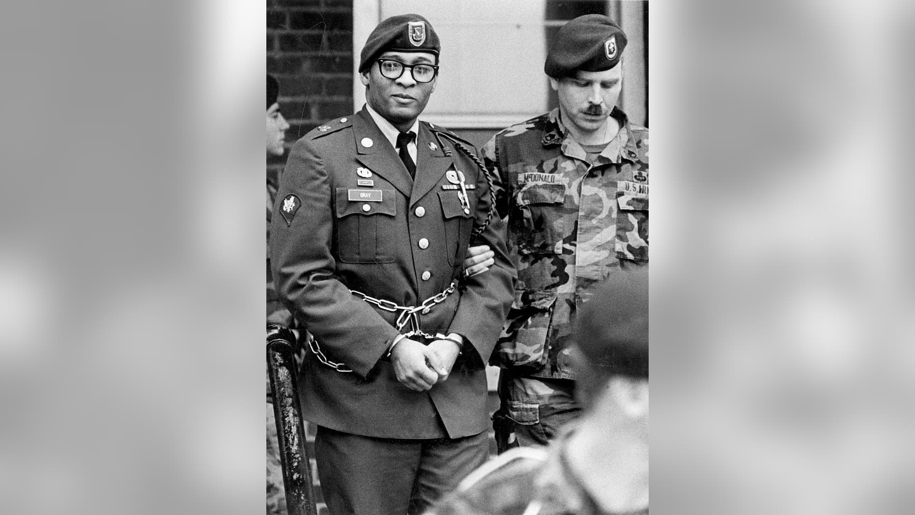 Ronald Gray, left, leaving a Fort Bragg courtroom in 1988.