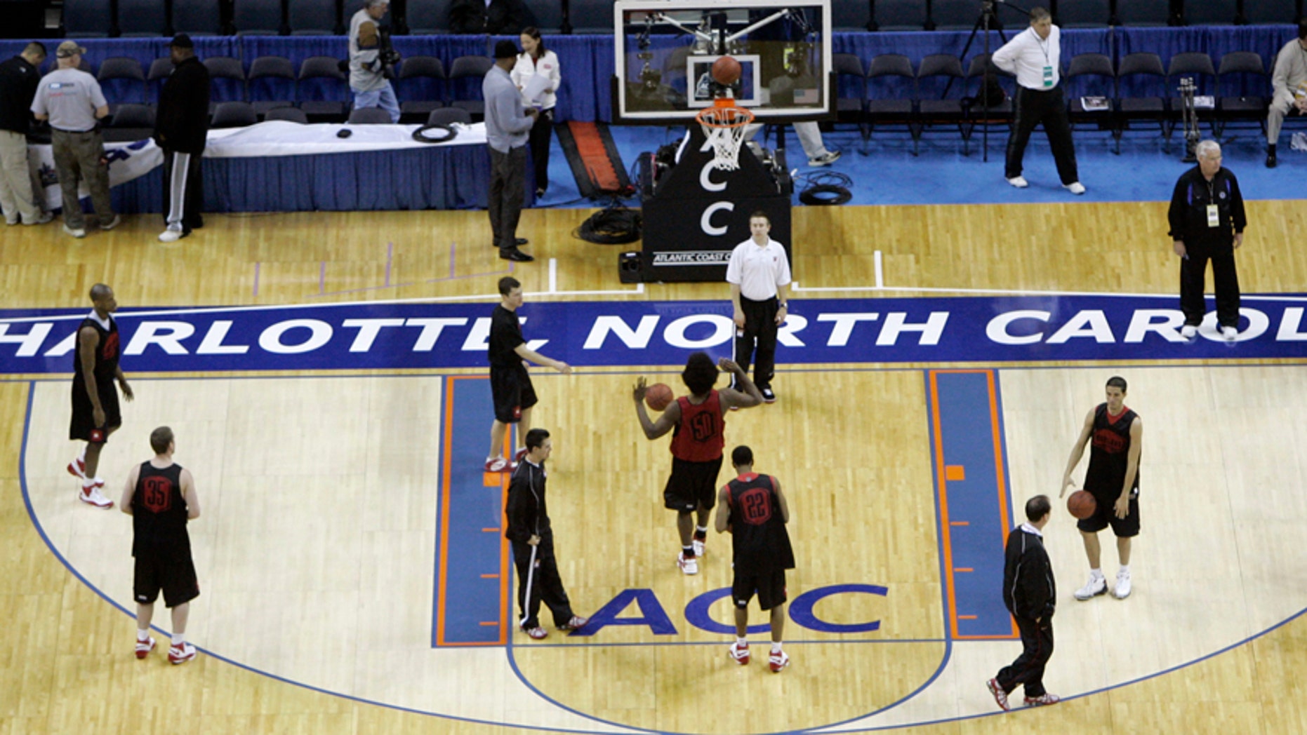 FILE - In this March 12, 2008, file photo, Maryland players practice for the Atlantic Coast Conference men's NCAA college basketball tournament at Bobcats Arena in Charlotte, N.C. The NCAA says it will consider North Carolina as a host for championship events again after the state rolled back a law that limited protections for LGBT people. In a statement Tuesday, April 4, 2017, the governing body said its Board of Governors had reviewed moves to repeal repealed the so-called "bathroom bill" and replace it with a compromise law. (AP Photo/Gerry Broome, File)