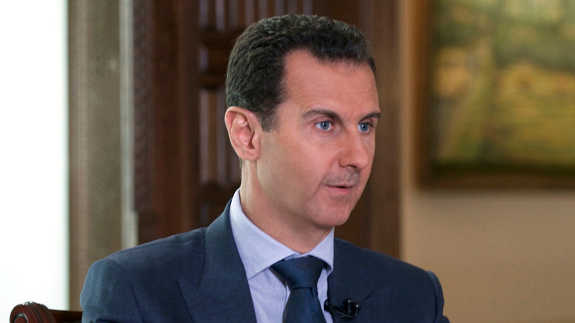 FILE -- In this Sept. 21, 2016 file photo released by the Syrian Presidency, Syrian President Bashar Assad speaks to The Associated Press at the presidential palace in Damascus, Syria. U.S. Secretary of State Rex Tillersons statement Tuesday, April 11, 2017, that the reign of President Bashar Assads family is coming to an end suggests Washington is taking a much more aggressive approach about the Syrian leader. Taking him out of the equation without a clear transition plan would be a major gamble. (Syrian Presidency via AP, File)
