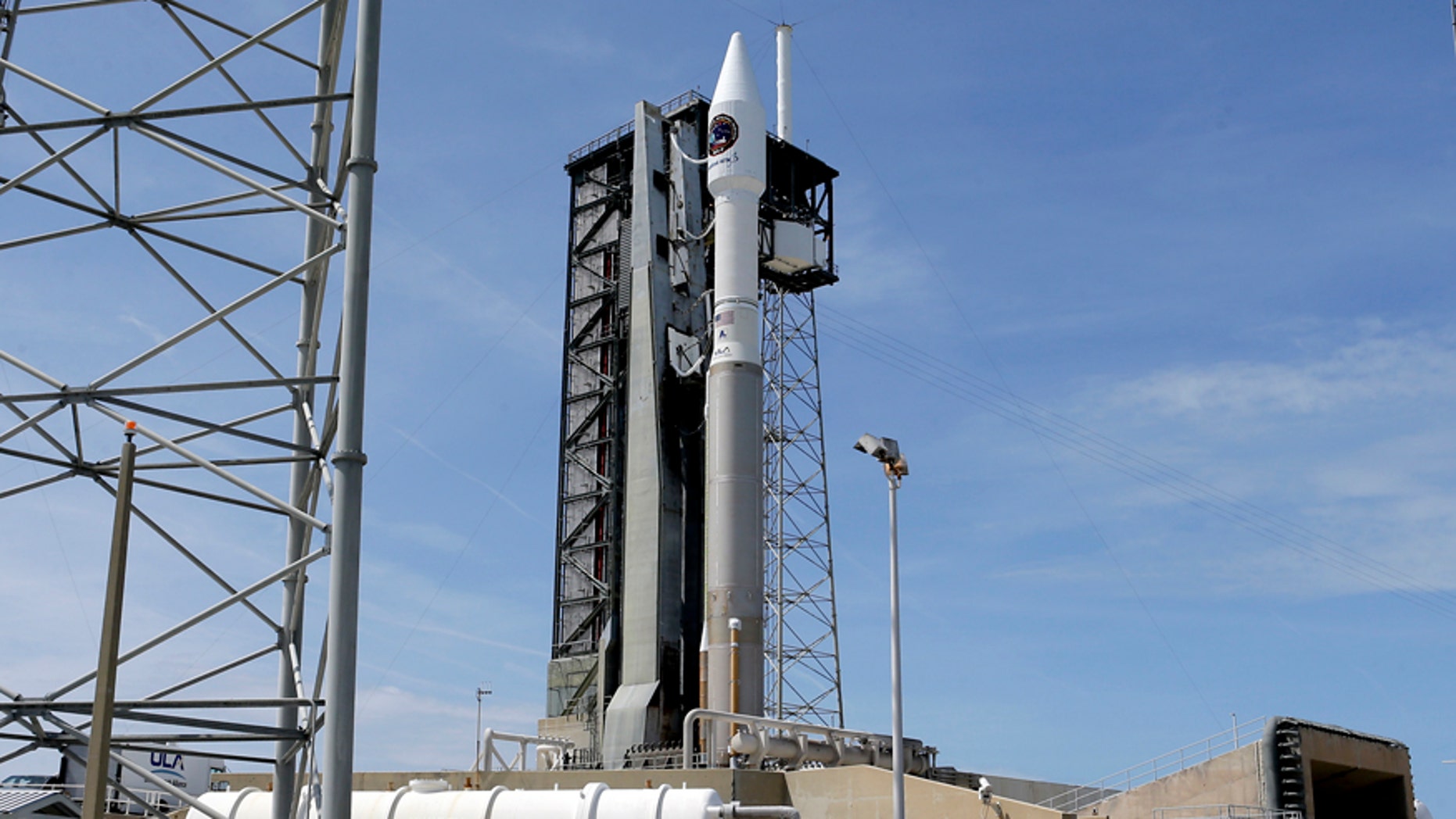 A United Launch Alliance Atlas V rocket that will carry supplies to the International Space Station stands ready at complex 41 at the Cape Canaveral Air Force Station, Monday, April 17, 2017, in Cape Canaveral, Fla. The launch is scheduled for Tuesday morning and for the first time, NASA cameras will provide live 360-degree video of the rocket heading toward space. (AP Photo/John Raoux)