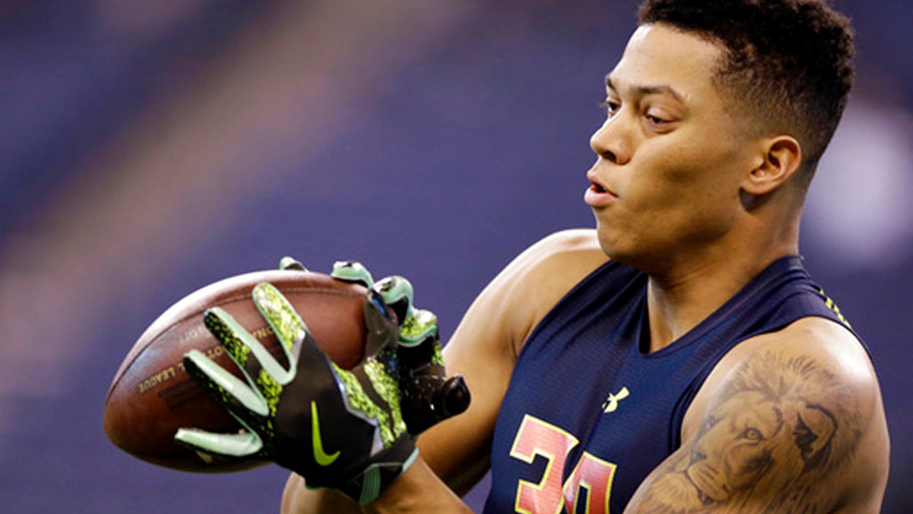 Air Force wide receiver Jalen Robinette makes a catch as he runs a drill at the NFL football scouting combine in Indianapolis.