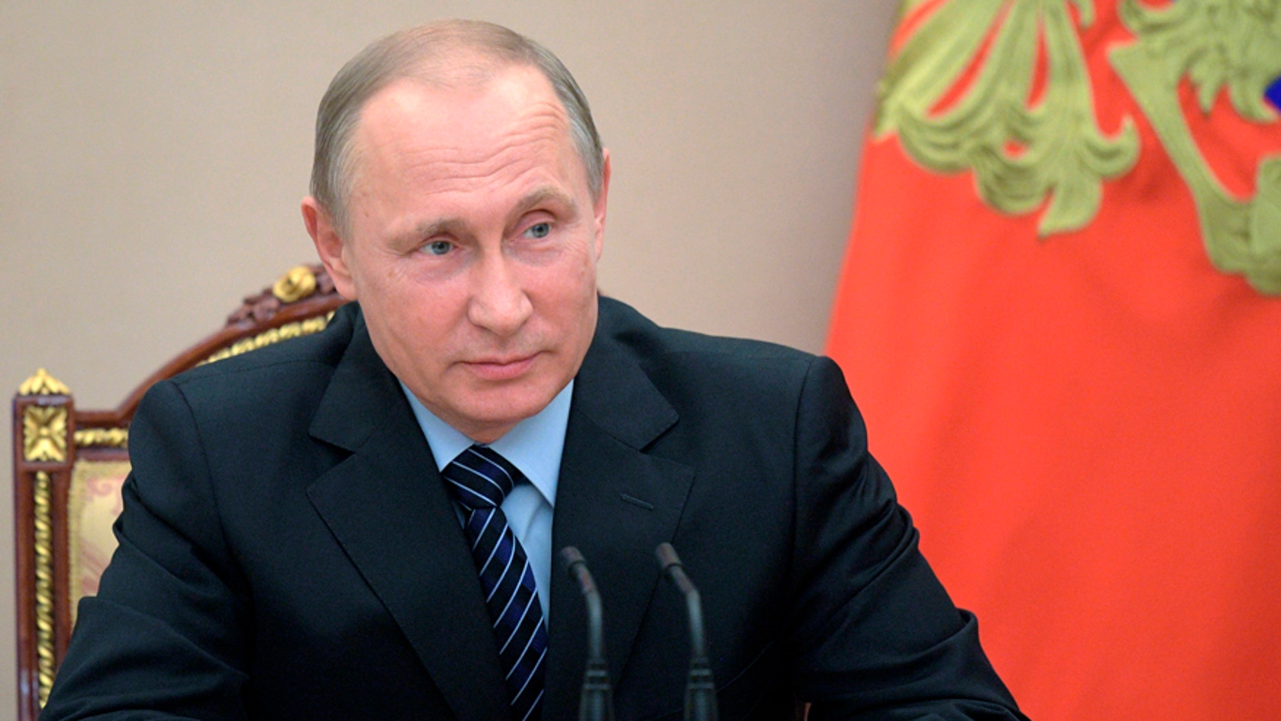 Russian President Vladimir Putin chairs a Security Council meeting in Moscow, Russia, Friday, June 16, 2017. The meeting was focused on the Russian military's claim that it had killed the Islamic State group's leader in an airstrike in Syria. (Alexei Druzhinin/Pool Photo via AP)