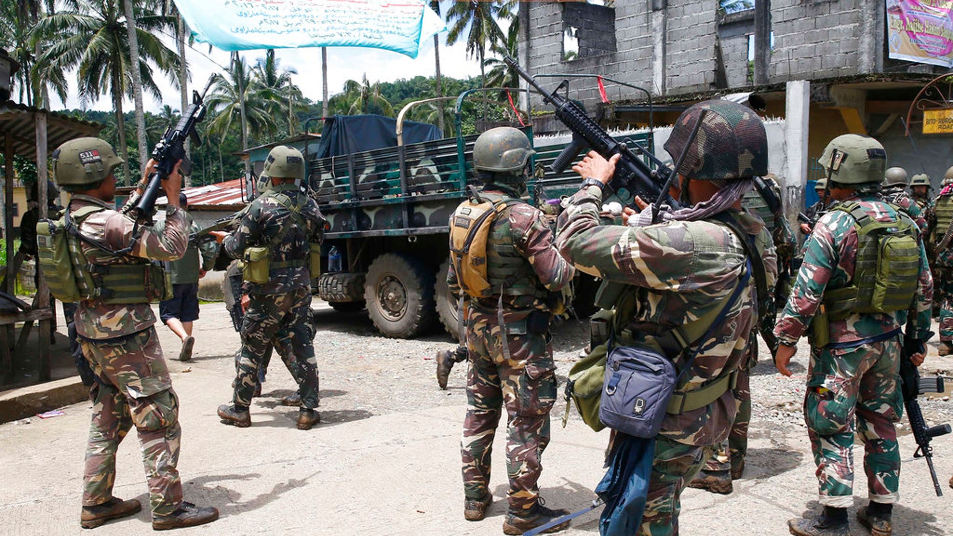 Philippines government troops prepare to head to the frontline as fighting with Muslim militants in Marawi city enters its second week in southern Philippines.