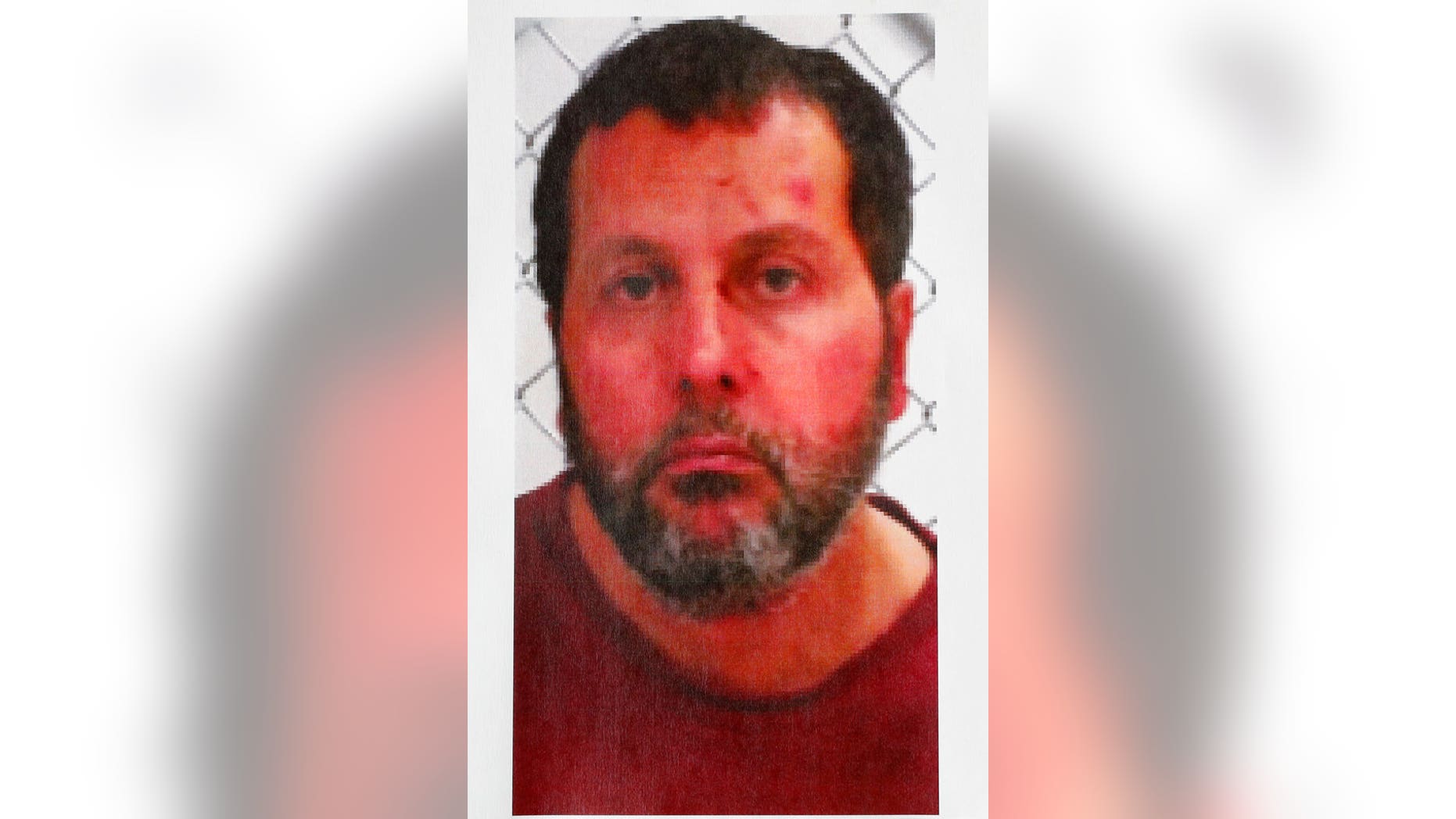 In this undated photo released by the FBI, Amor Ftouhi is shown. Ftouhi, a Canadian man, shouted in Arabic before stabbing a police officer in the neck at the Bishop International Airport in Flint, Mich., on Wednesday. The FBI says Ftouhi, 49, tried unsuccessfully to buy a gun while in the United States for five days. (AP Photo/Paul Sancya)