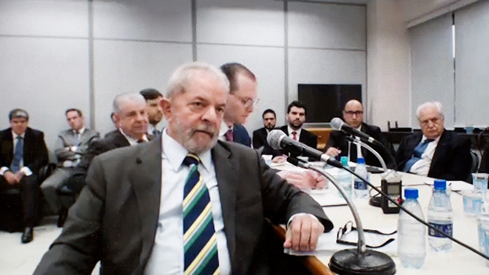 This screen grab of a video recorded on May 10, 2017, released by the Parana Federal Justice department, shows Brazil's former President Luiz Inacio Lula da Silva testifying in the Car Wash investigation in Curitiba, Brazil. A federal judge convicted the ex-president of corruption and money laundering on Wednesday, July 12, 2017 and sentenced him to nine and a half years in jail. Silva will remain free while an appeal is heard. (Parana Federal Justice department via AP)