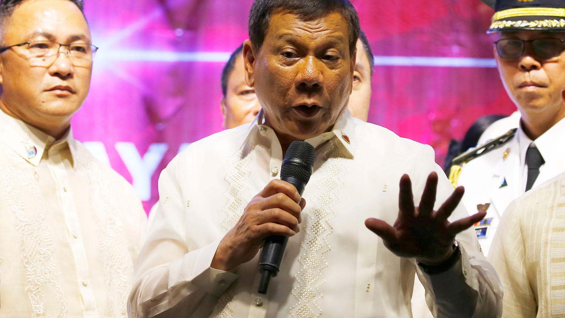 Philippine President Rodrigo Duterte addresses protesters following his state of the nation address, July 24, 2017.