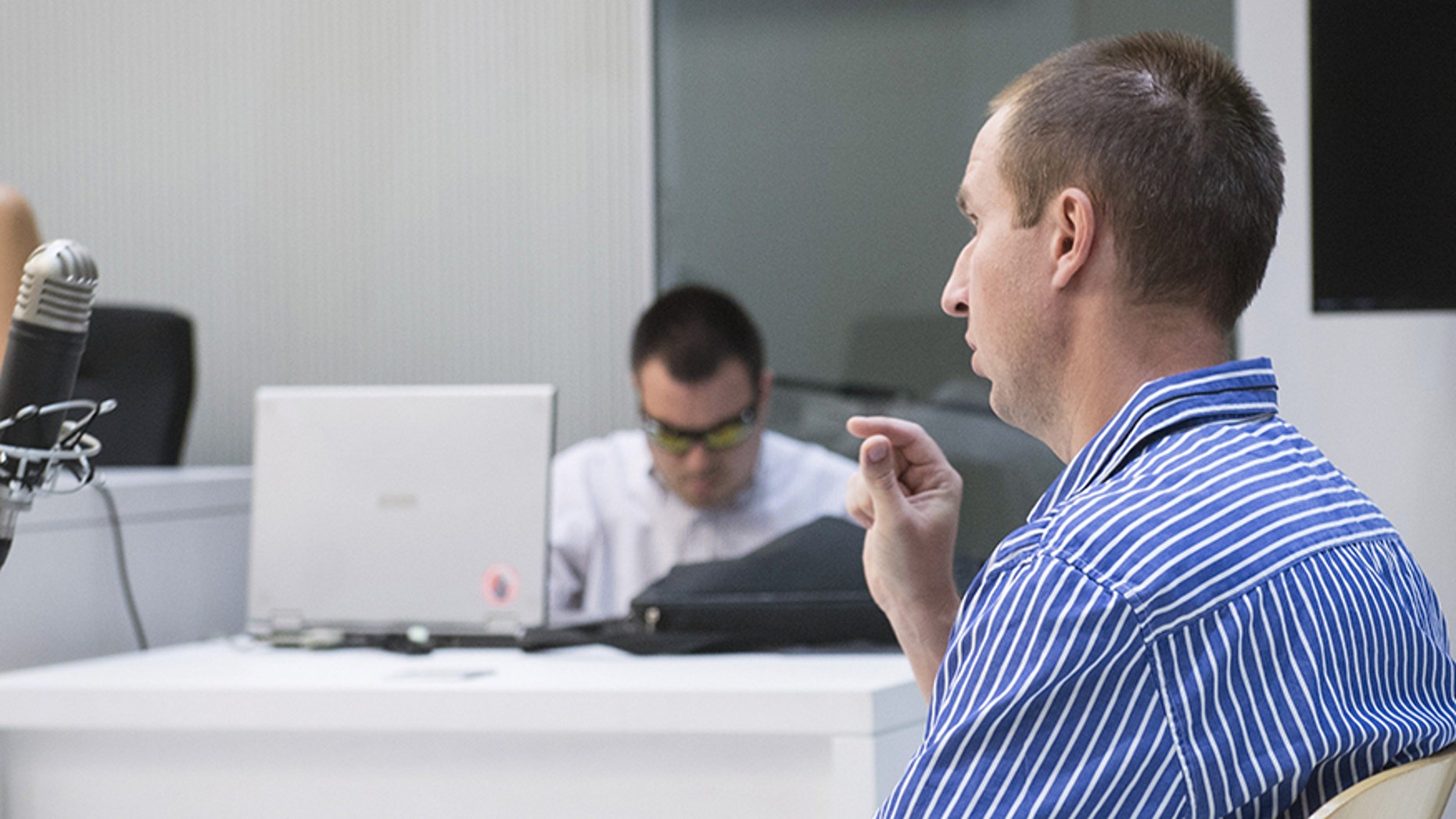 Alleged hacker Pyotr Levashov, speaks during a hearing to consider his extradition to the United States, at the National Court in Madrid.