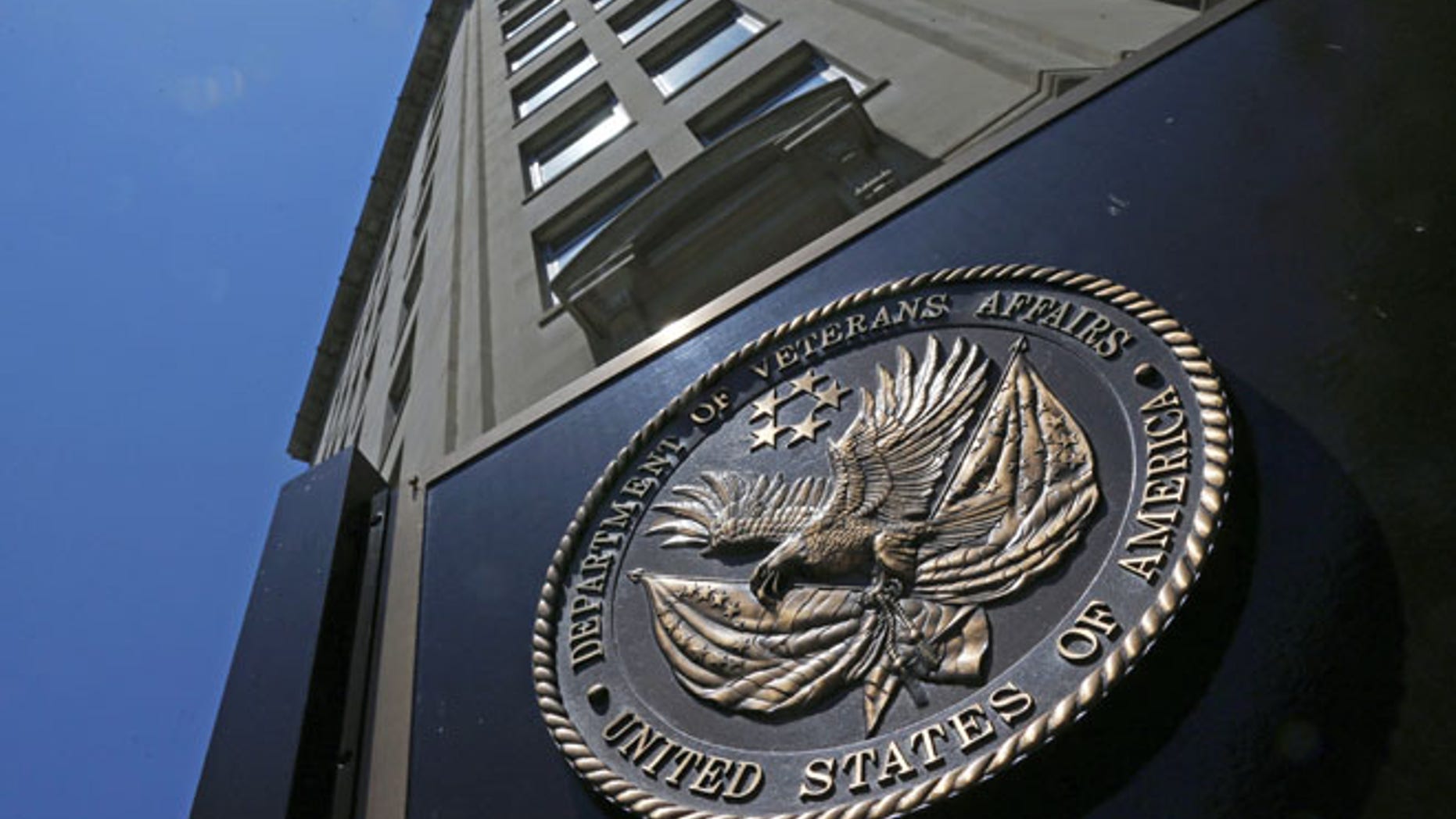 In this June 21, 2013, file photo, the seal affixed to the front of the Department of Veterans Affairs building in Washington.