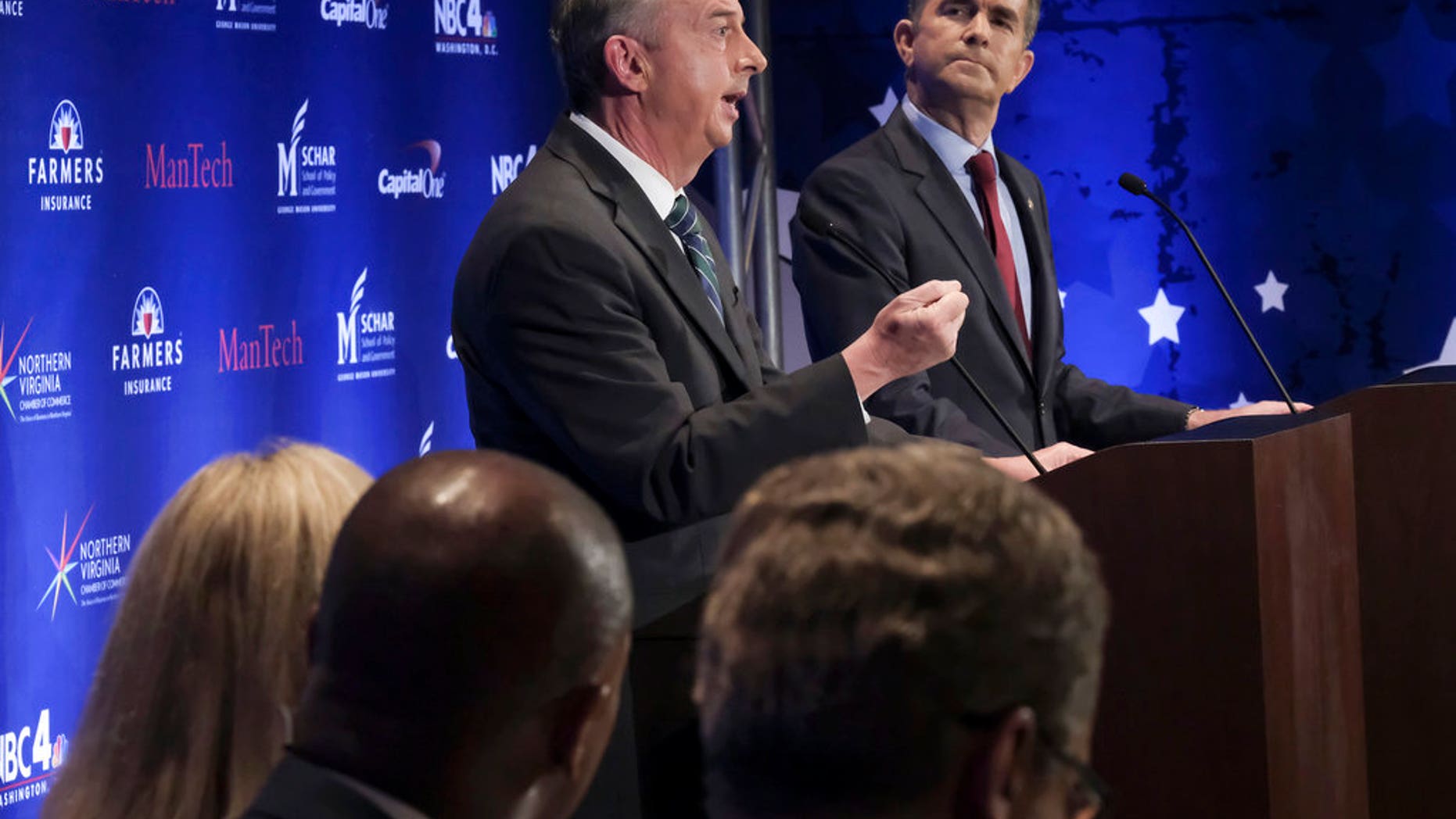 Gubernatorial candidates Ed Gillespie, left, a Republican, and Lt. Gov. Ralph Northam, a Democrat, face off in next month's election.