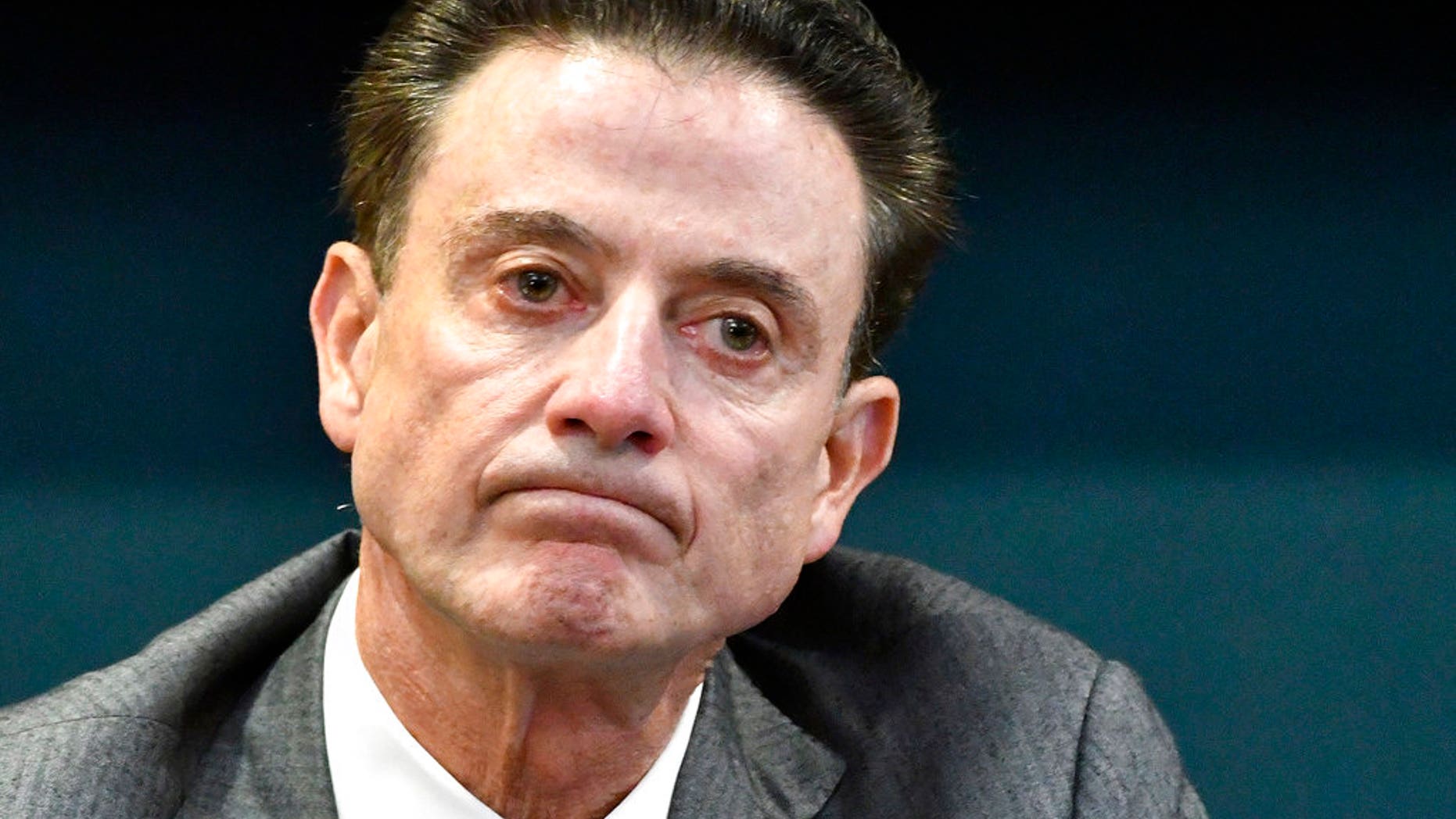 Louisville basketball coach Rick Pitino was fired Monday after the launch of a federal fraud investigation.
