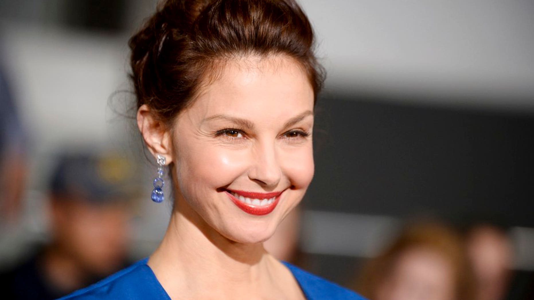 Ashley Judd poses on the red carpet.