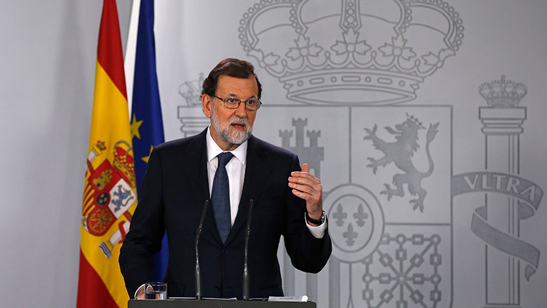 Spain's Prime Minister Mariano Rajoy gestures as he speaks during a press conference at the Moncloa Palace in Madrid, Spain, Wednesday, Oct. 11, 2017. The Spanish Cabinet met in Madrid Wednesday to work out its response to an announcement from the head of the wealthy Catalonia region that he was proceeding with a declaration of independence, further fueling Spain's worst political crisis in decades. (AP Photo/Paul White)
