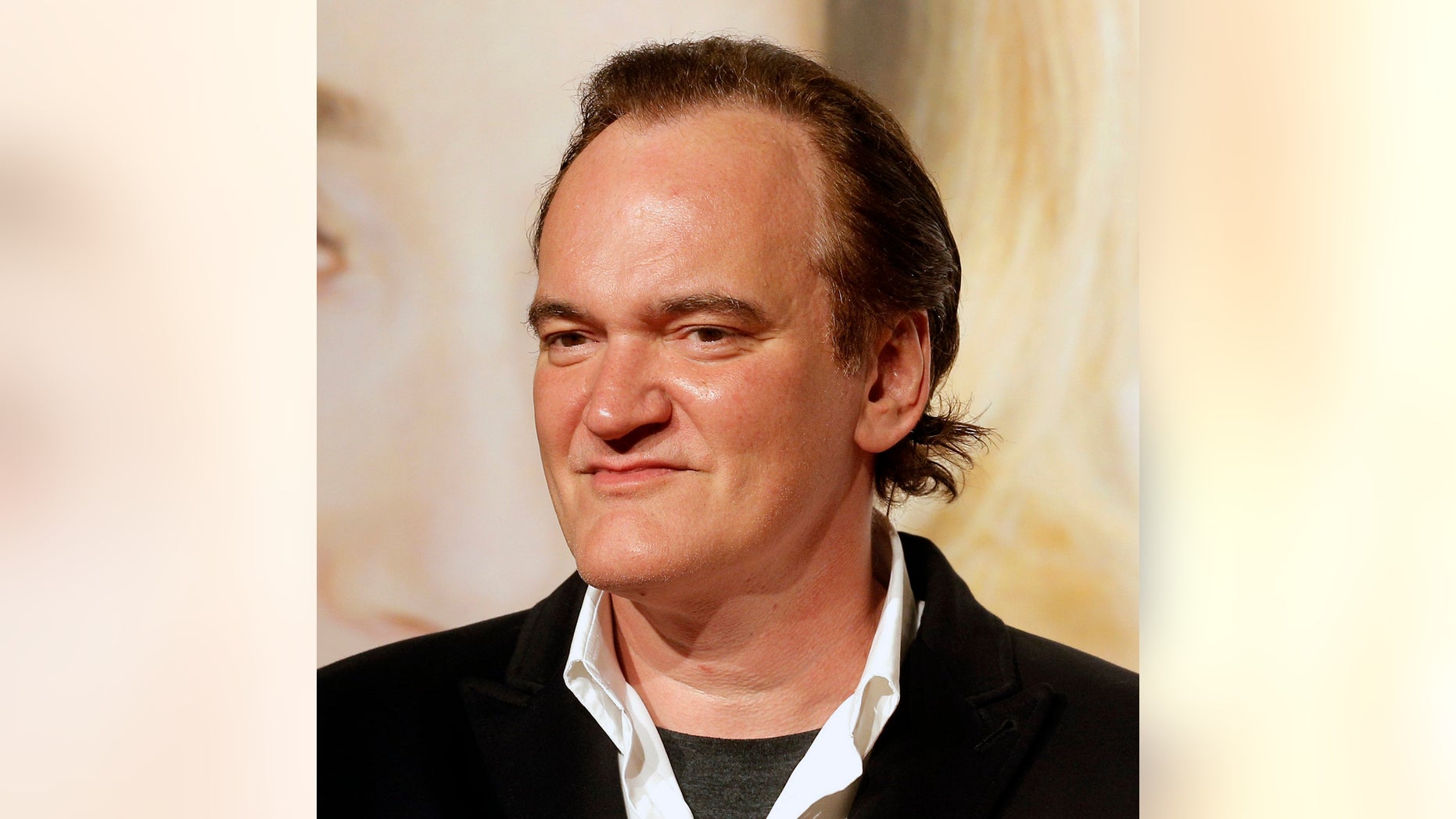 FILE - In this Oct. 8, 2016 file photo, director Quentin Tarantino poses for photographers at the opening ceremony of the 8th Lumiere Festival, in Lyon, central France. Tarantino says he knew about a few instances of improper conduct by producer Harvey Weinstein and wishes he had done more. Speaking to The New York Times in an interview published Thursday, Oct. 19, 2017, Tarantino expressed remorse for not having taken responsibility at the time. He says he knew first hand of Weinsteinâs conduct toward actress Mira Sorvino and another he declined to name. Sorvino and Tarantino were dating at the time. (AP Photo/Laurent Cipriani, File)
