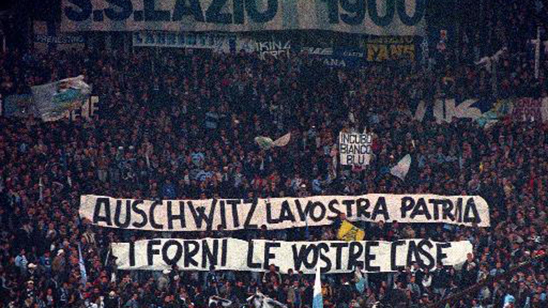 Known for its long history of racism and anti-Semitism, fans of the Italian soccer team Lazio hit a new low when they littered the Stadio Olimpico in Rome with superimposed images of Anne Frank wearing a Rome Jersey.