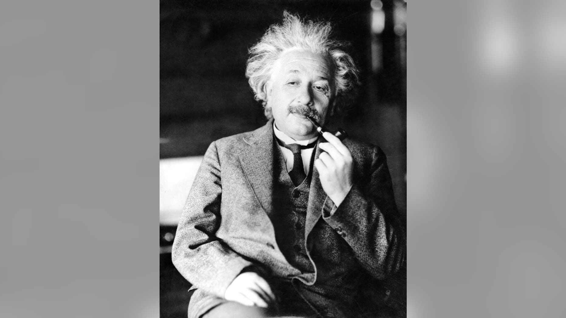 Albert Einstein's handwritten note to a bellboy while traveling in Japan in 1922 fetched $1.56 million at a Jerusalem auction, The Winner auction house said.